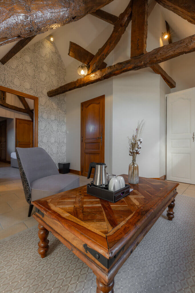 Salon de chambre familiale de l'hotel Ferme de la Ranconniere en Normandie