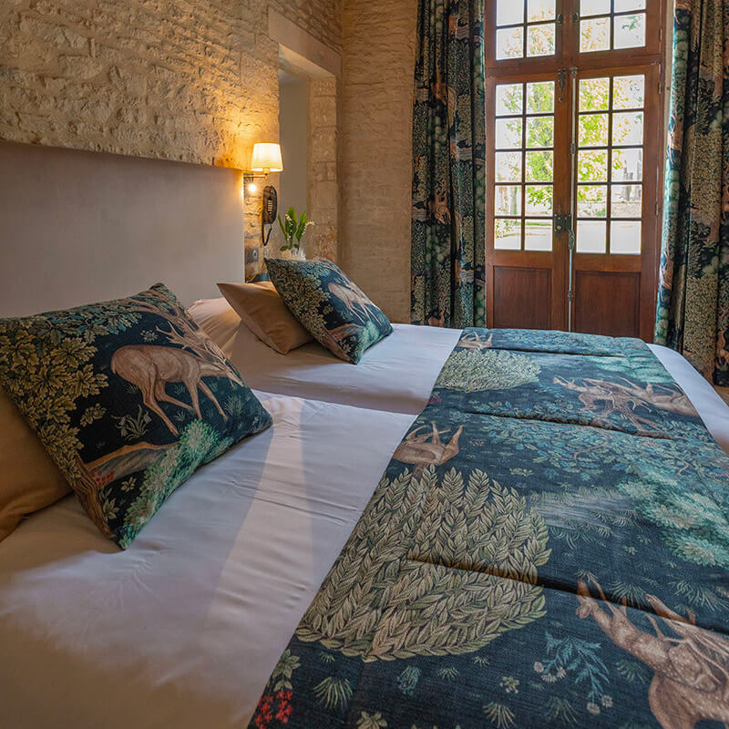 Charming room and suites at the luxury hotel Ferme de la Ranconniere in Normandy