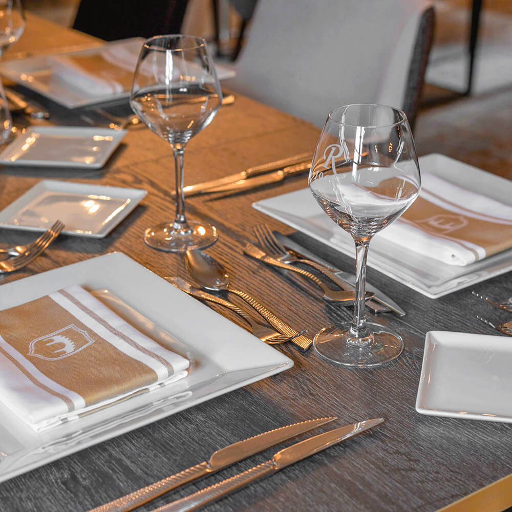 Table in the restaurant of the luxury hotel Ferme de la Ranconniere in Normandy